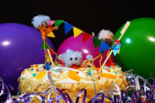 Fubby adventure in party mood with cake.