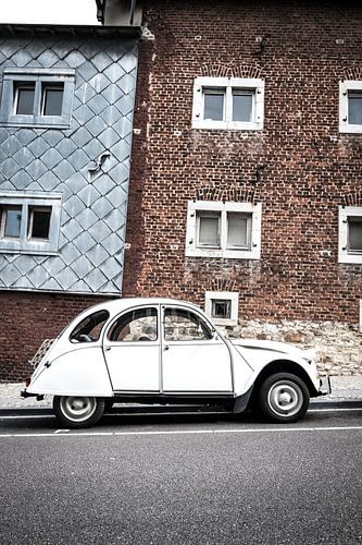 Citroën 2CV car parked on the side of the street by Sjoerd van der Wal Photography
