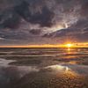 Coucher de soleil sur la mer des Wadden sur Jan Koppelaar