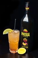 Coebergh Classic cocktail with bottle and orange garnish