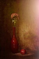 Red still life with red vase, red apple, red flower