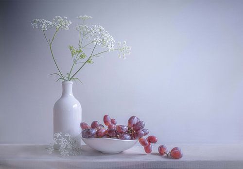 Still life with flower and grapes