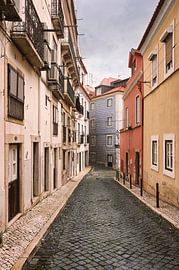 Quiet alley in Alfama - azulejos and cobblestones in Lisbon