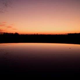 Niederländischer Sonnenuntergang mit Reflexion von Coco Everts