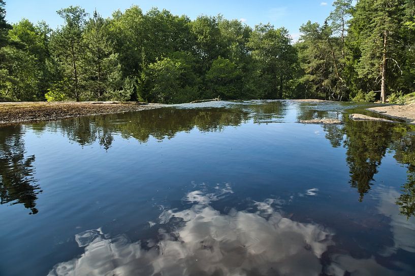Idyllic lake in Sweden, with tree and cloud reflections in a clear natural setting by Martin Köbsch