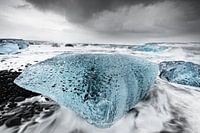 Big block of ice in the surf