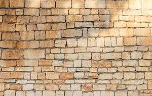 Stone wall background texture, structure close-up by Alex Winter