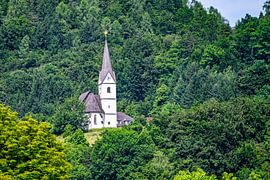 A view of the shoreline landscape of Lake Woerthersee in Austria. by Andreas Völkel