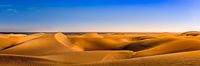 Gran Canaria met zandduinen bij Maspalomas en uitzicht op zee.