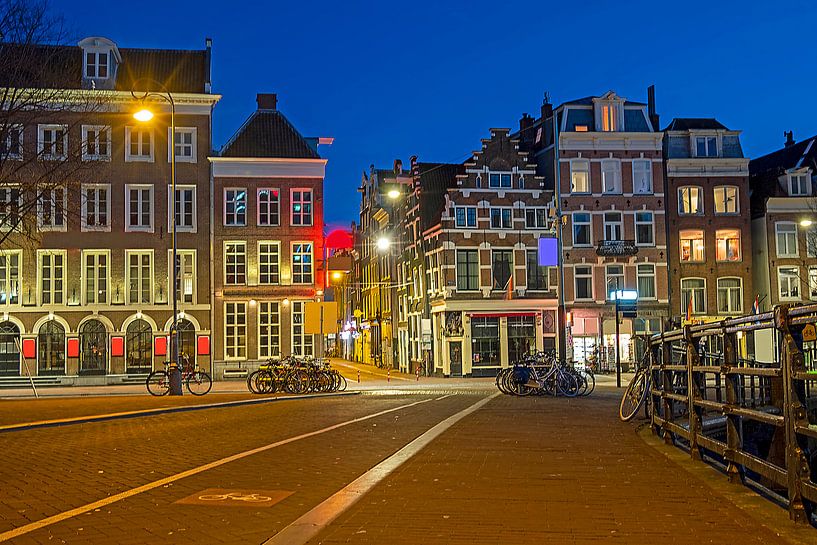 Cityscape of Amsterdam at sunset by Eye on You