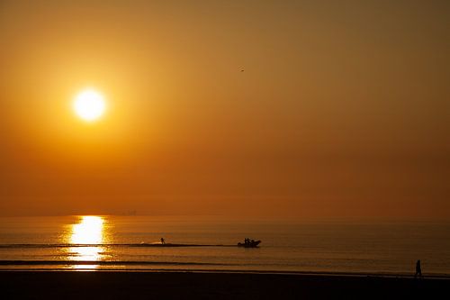Zonsondergang met waterski&euml;r