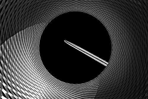 Architecture in black and white with aeroplane