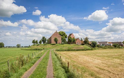 Medieval church in the village of Ezinge on a mound in Groningen