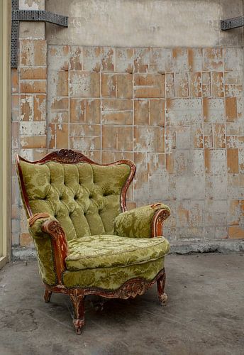 Versleten fauteuil