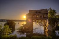 Zonsondergang aan een pittoreske oude molen