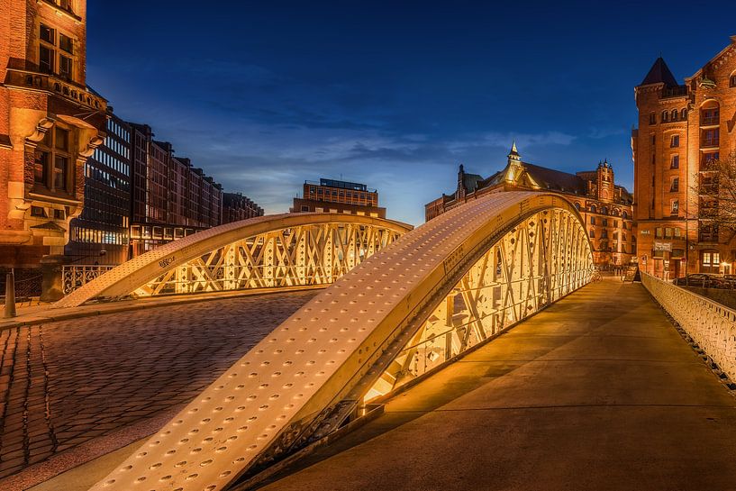 Hamburg warehouse district with old bridge. by Voss photography