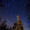 Star trails at the Christ statue by Bert Beckers