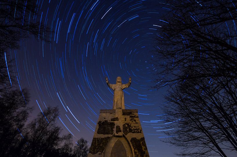 Star trails at the Christ statue by Bert Beckers