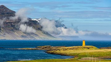 Small orange lighthouse by Denis Feiner