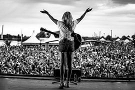 Singer on stage at festival by Chantal Sloep