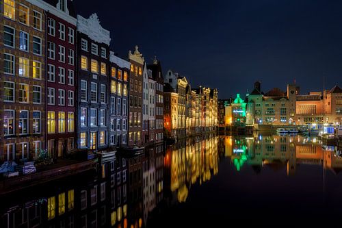 Reflections on the Damrak in Amsterdam