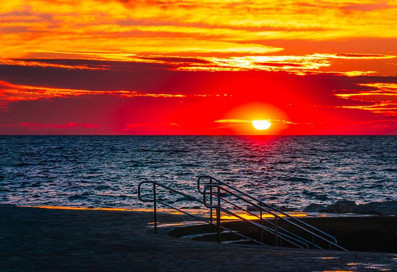 Sunset on the beach by Mustafa Kurnaz