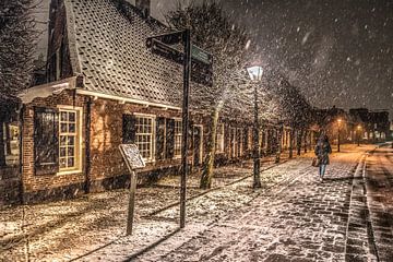 The Groeneweg in Leeuwarden in the evening snow by Harrie Muis