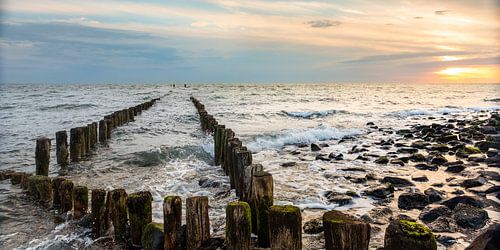Zonsondergang aan zee