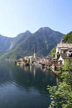 The picturesque village is sandwiched between Lake Halstättersee and the Dachstein Mountains. by Ton Tolboom