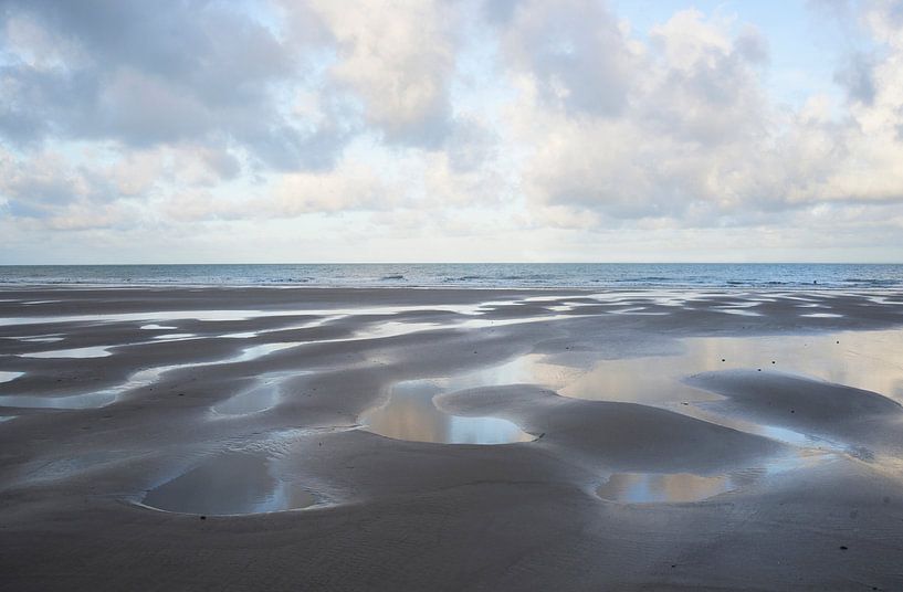 Structures and reflections of the cloudy sky on the beach near Wissant (Opal Coast, France) by Birgitte Bergman