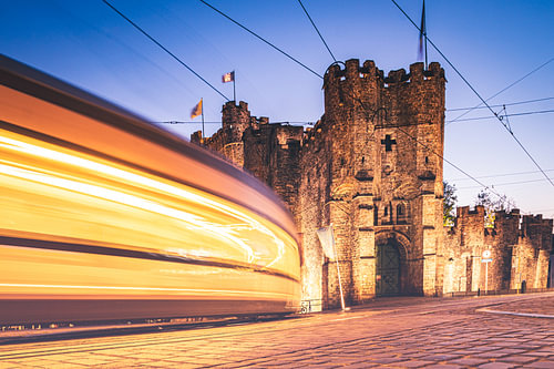 Passing cable car at the Castle of the Counts in Ghent.