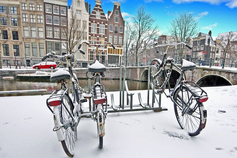 Besneeuwd Amsterdam in de winter in Nederland von Eye on You