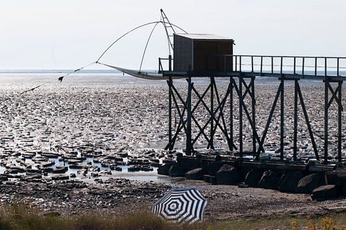 Fishing hut at low tide
