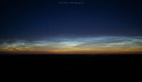 The luminous night clouds from the sea dyke (Friesland)