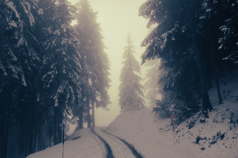Innsbruck in fog and snow by Travel.san