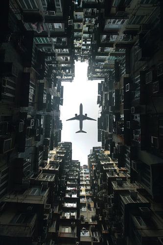 Vliegtuig boven de stad