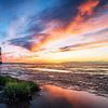 Vuur boven het wad – De vuurtoren Obereversand in een kleurenpracht van Steffen Peters