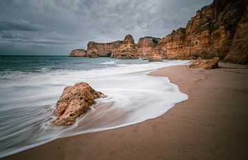 The imposing cliffs in the Algarve , Portugal by Bart cocquart