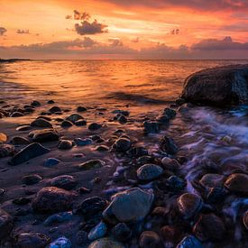 Sonnenuntergang am Strand auf der Insel Fehmarn, Deutschland von Raphael Koch