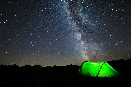 Milky way galaxy above the tent in the Austrian mountains