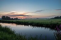 Nederlands landschap zonsondergang zonsopgang weiland