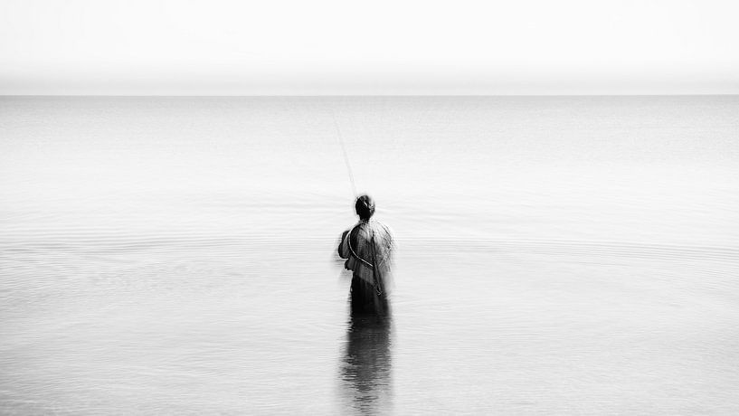 Artful angler in the sea by Heiko Westphalen
