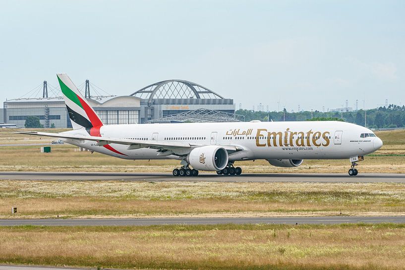 Emirates Boeing 777-300 passenger jet takes off. by Jaap van den Berg