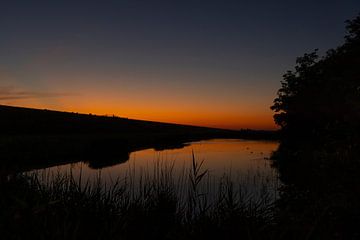 Waddenzee, zonsopkomst bij Paesens Moddergat achter de dijk
