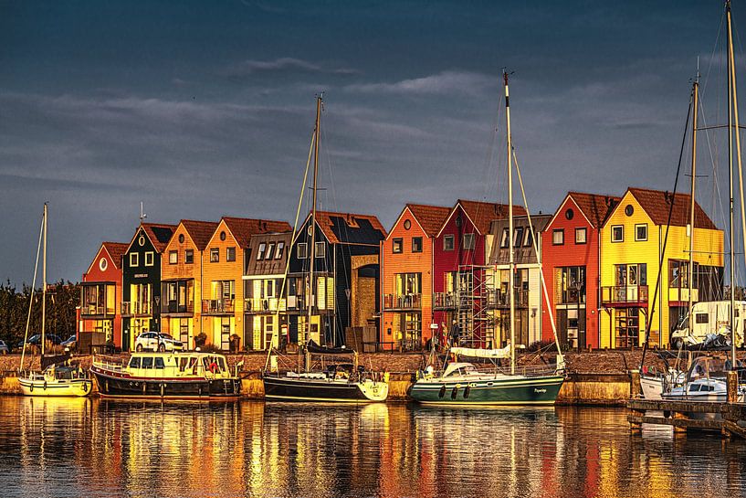Stavoren harbour in the light of the setting sun by Harrie Muis
