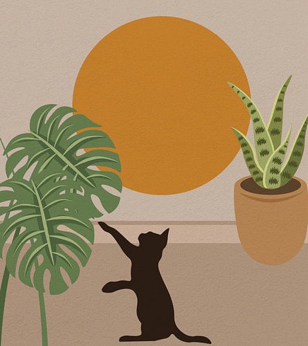 Eine niedliche Katze, die nach Blättern greift