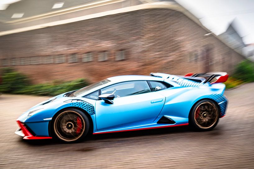 Lamborghini Huracán STO sports car driving by Sjoerd van der Wal Photography
