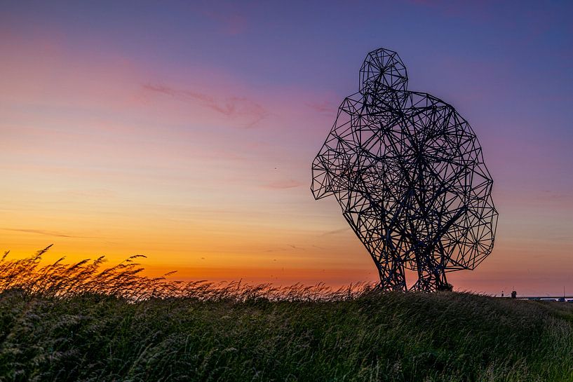 Crouching man by Michael Brand
