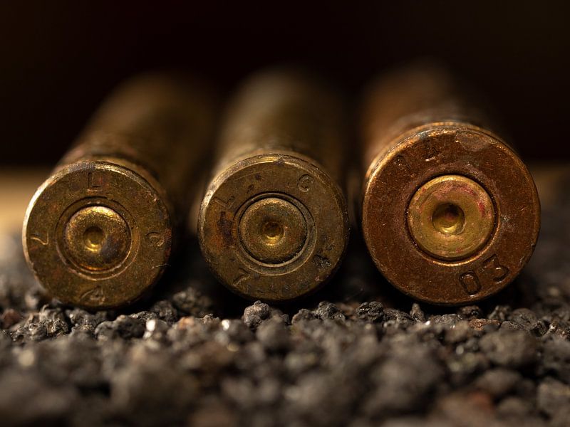 3 bullet shells close up by Robin Jongerden