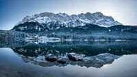 Eibsee in winter with snow and reflection of Zugspitze